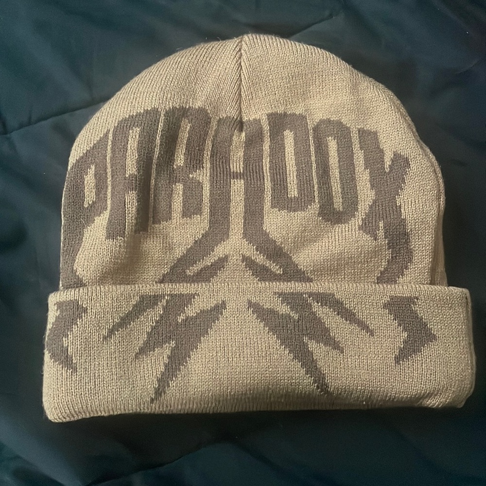 paradox beanie , folded brown. Real from the paradox website. Never was worn